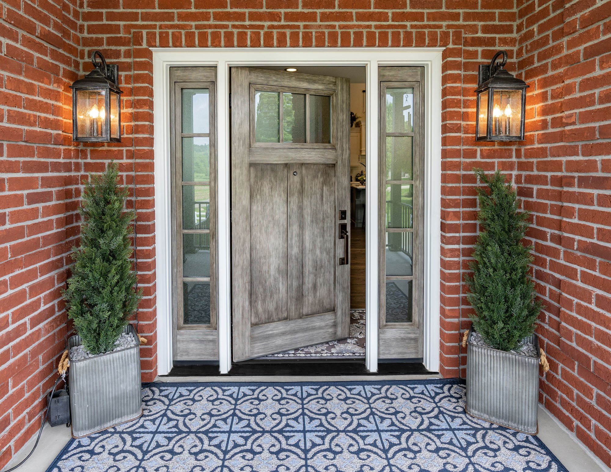 ProVia Signet wood-grain entry door with sidelights